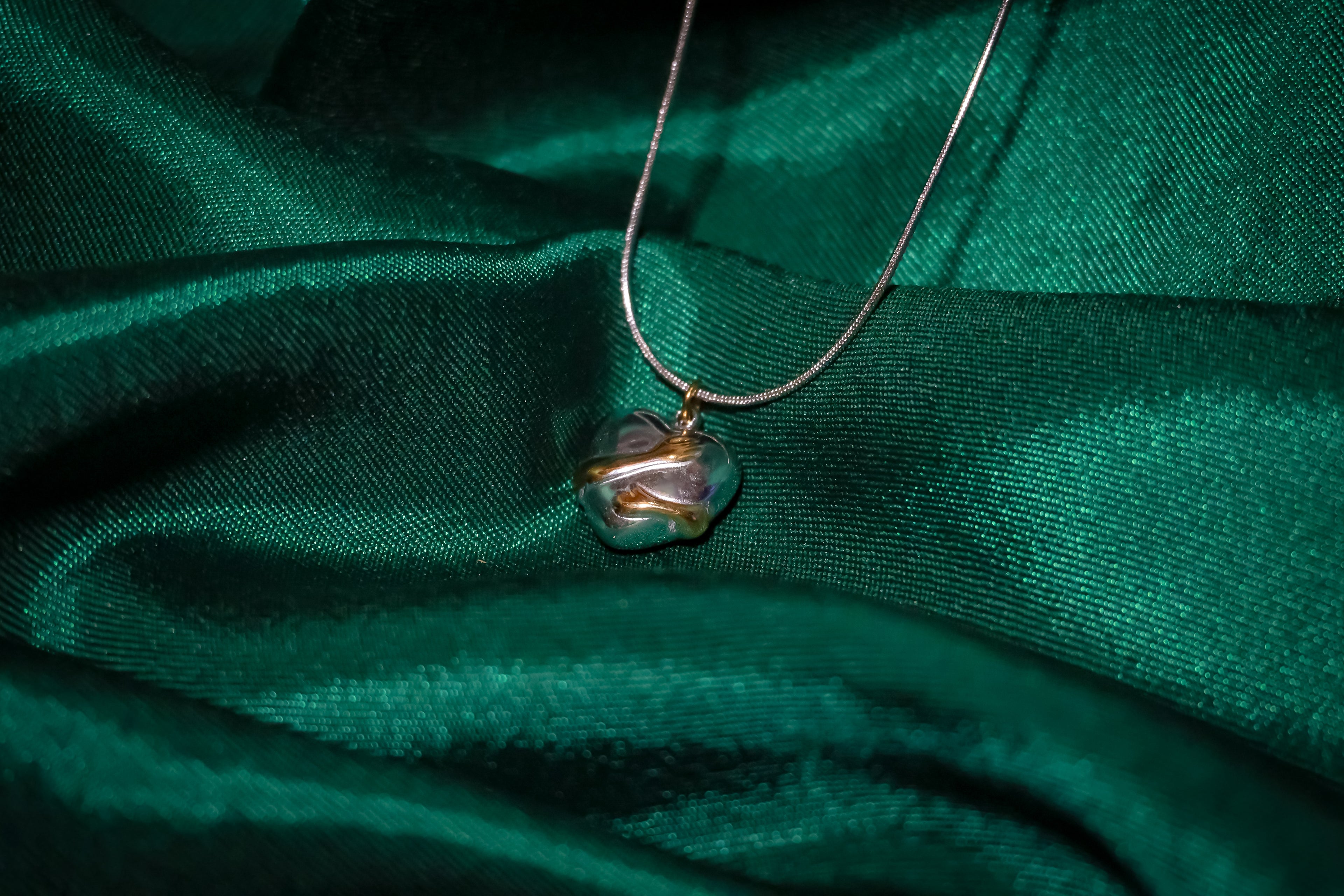 Dualtone Hugging Heart Pendant Necklace